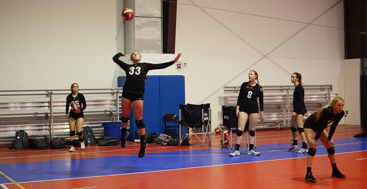 Claire Clark age 17 of Dallas – patient Volleyball players at practice