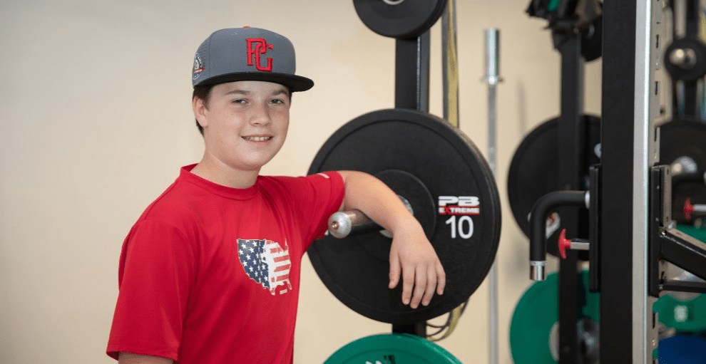 Baseball-header-parker-elbow Parker at Frisco therapy gym for OT and Bridge program