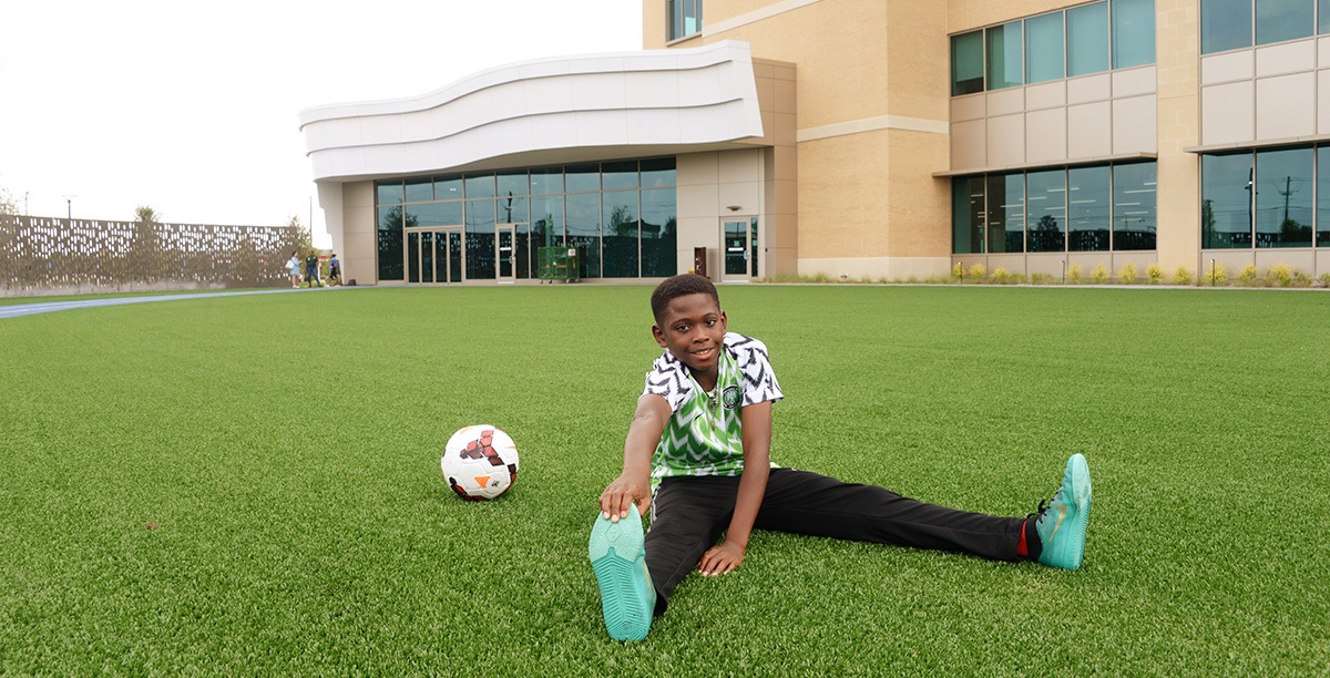 Sports medicine patient stretching at the Frisco campus.