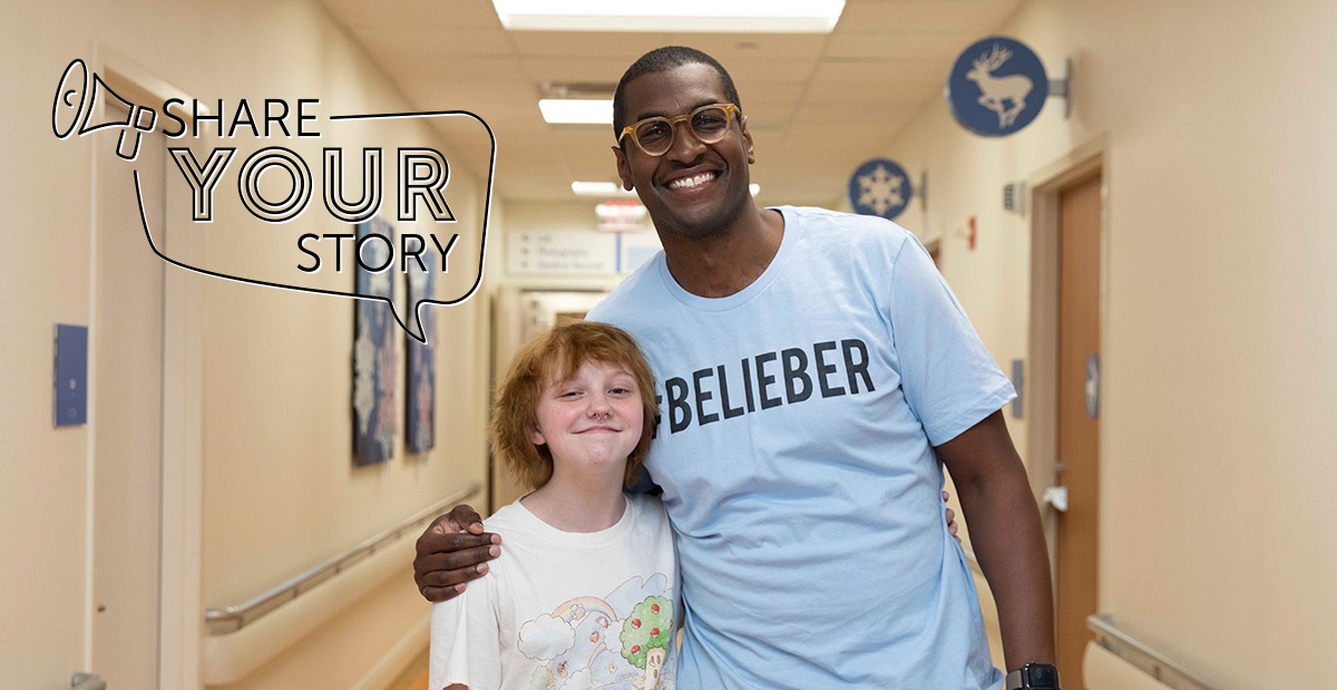 header-Finn tween boy and adult standing in hallway
