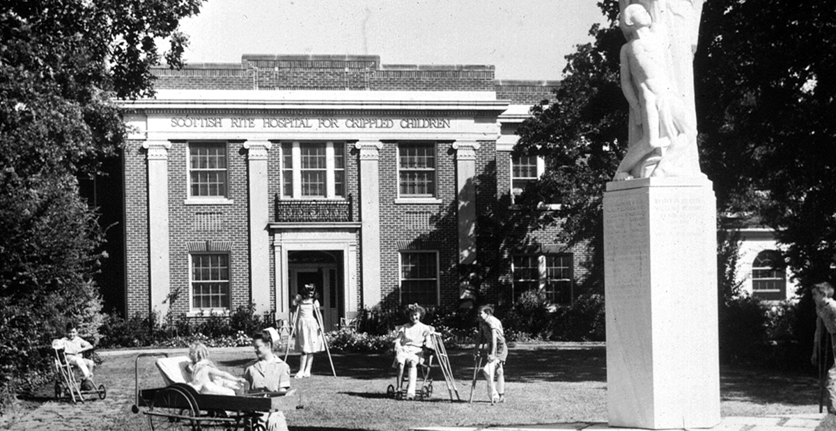 1930-old-hospital-and-patients-copy SCOTTISH RITE HOSPITAL FOR CRIPPLED CHILDREN. A black and white photo of the scottish rite hospital for orphaned children