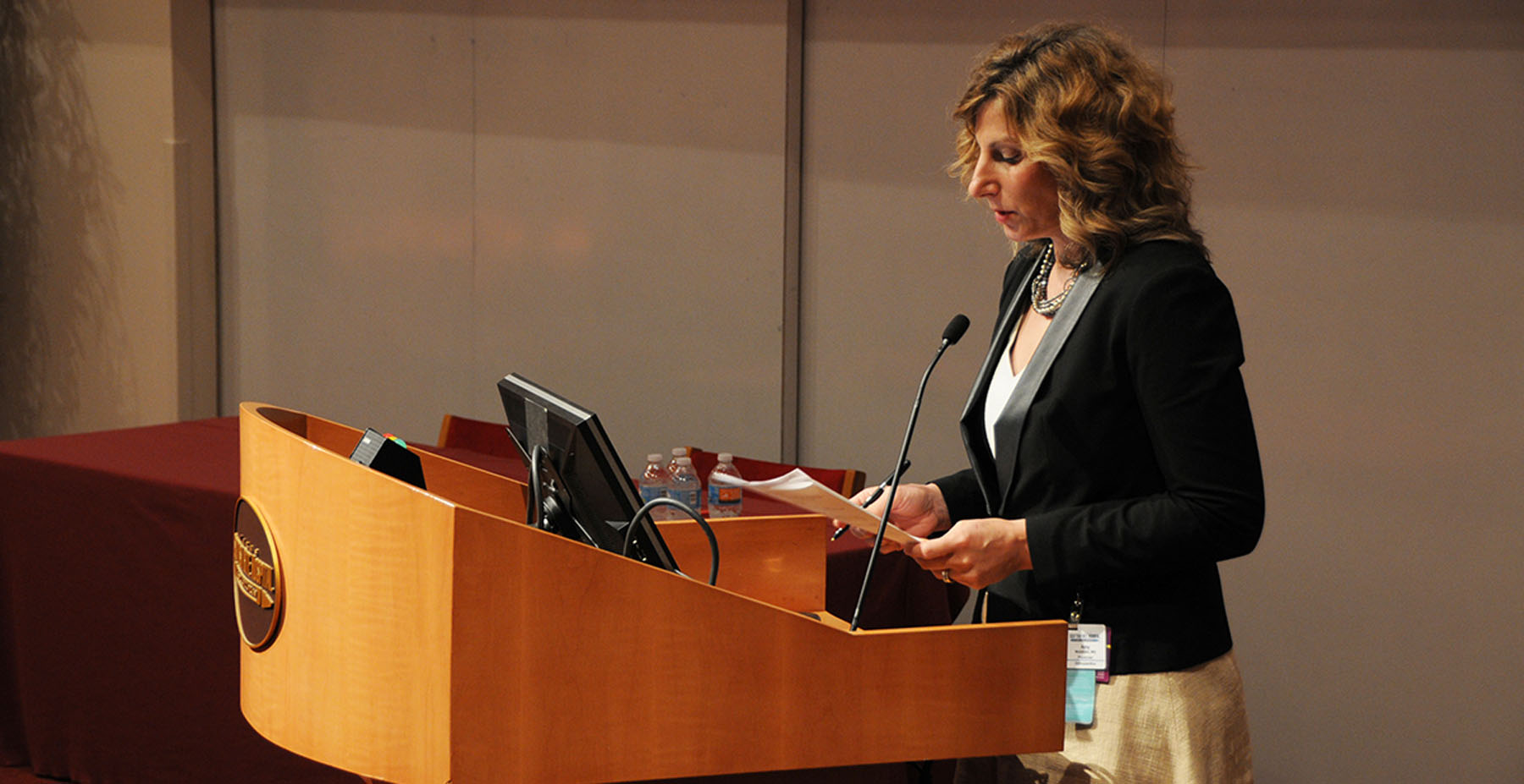 Amy McIntosh Dr. McIntosh giving a presentation at a medical conference.