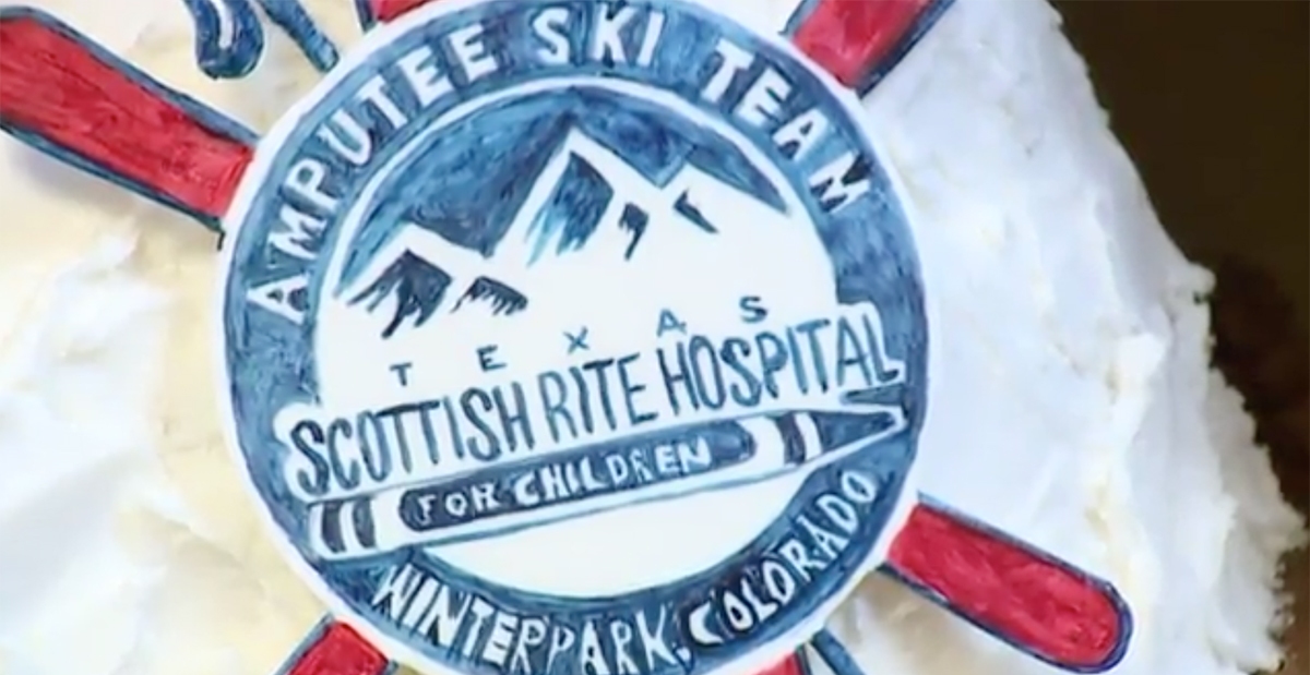cw33-ski-trip-2018 ski trip logo on cake