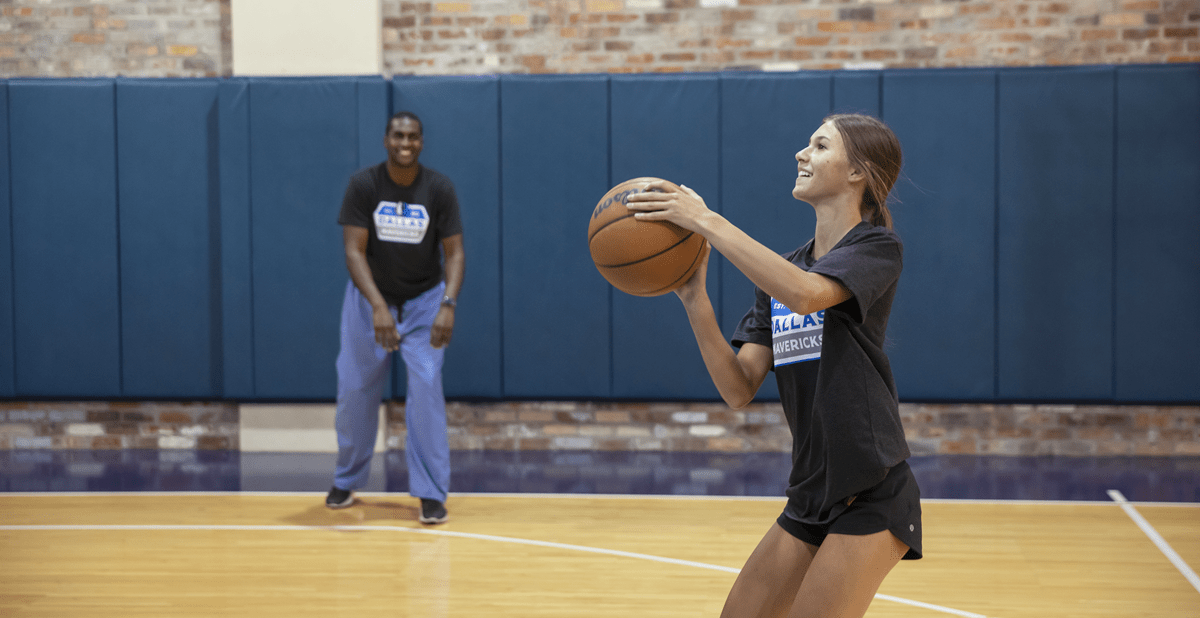 Gracee-and-Dr-Brooks_1 Dr. Brooks and patient, Gracee, playing basketball